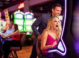 Live roulette wheel spinning with betting interface visible
